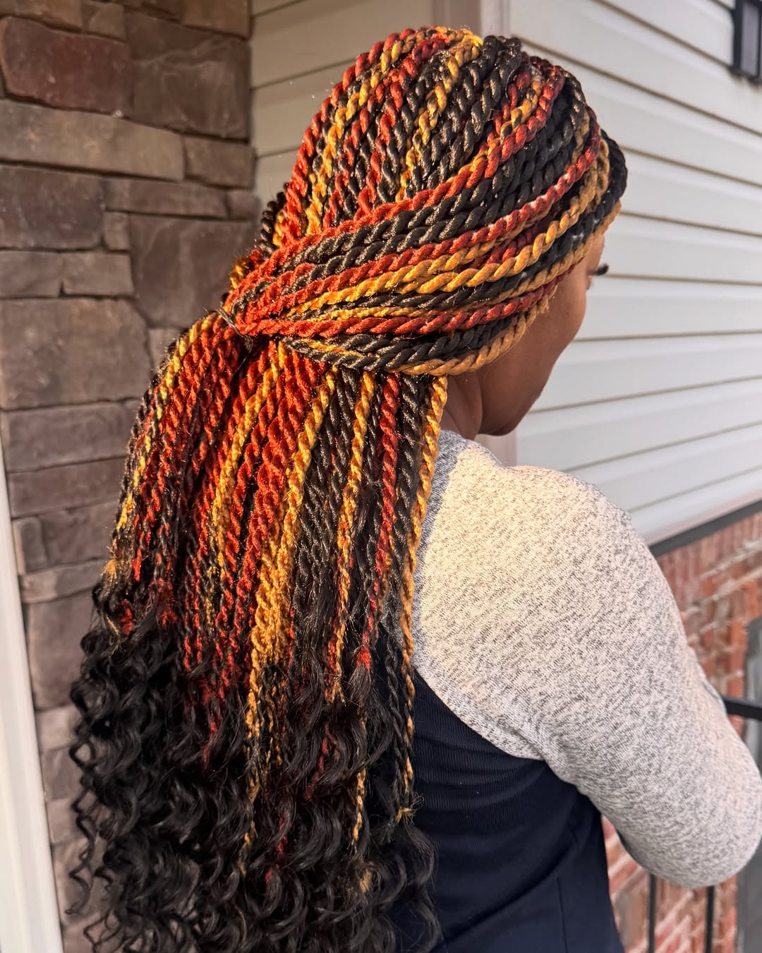 Chic Twisted Senegalese Braids with Vibrant Highlights