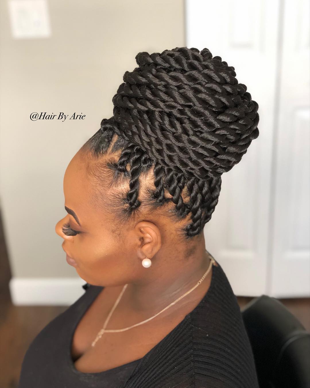Elegant High Twisted Bun with Senegalese Twists
