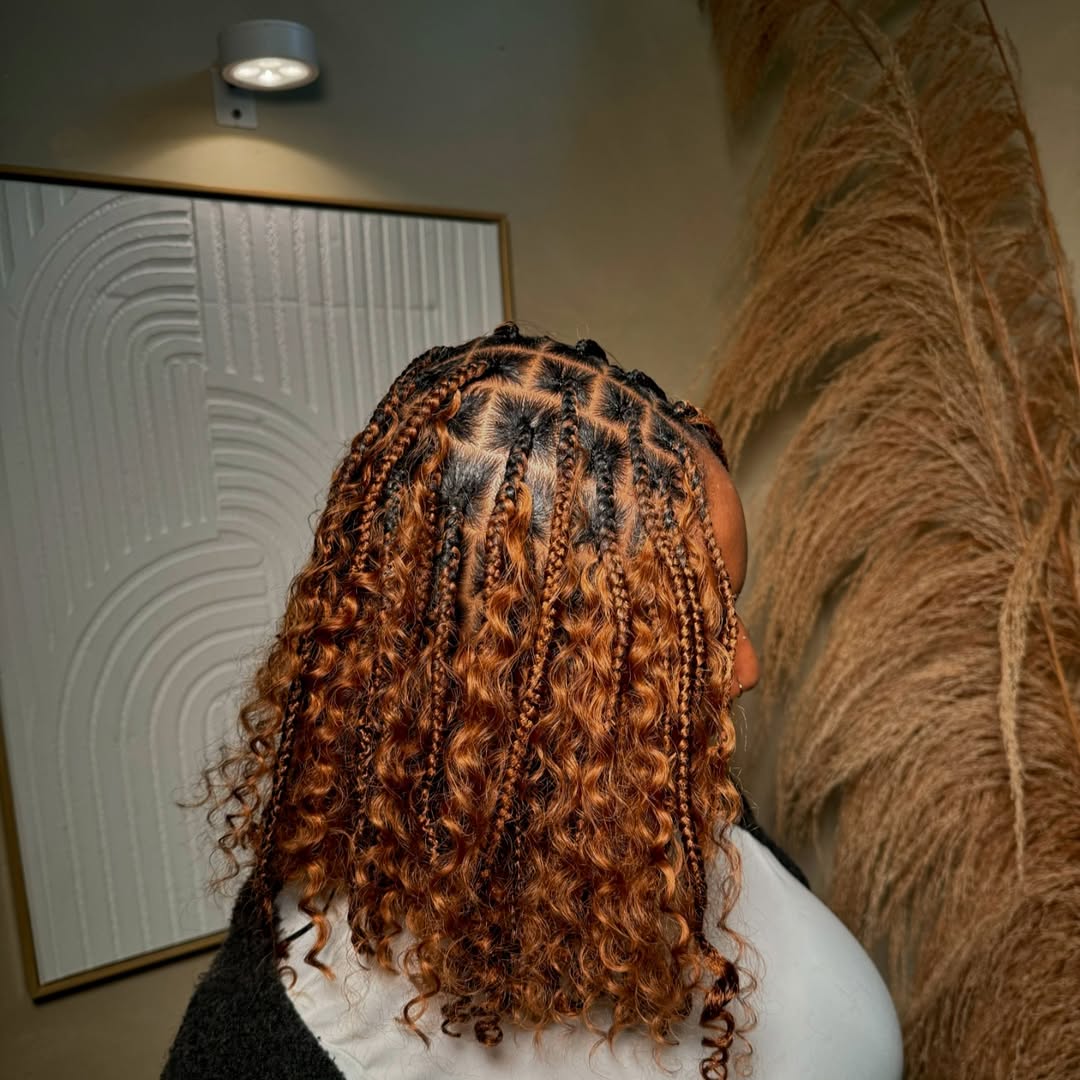 Radiant Shoulder-Length Knotless Box Braids with Defined Curls