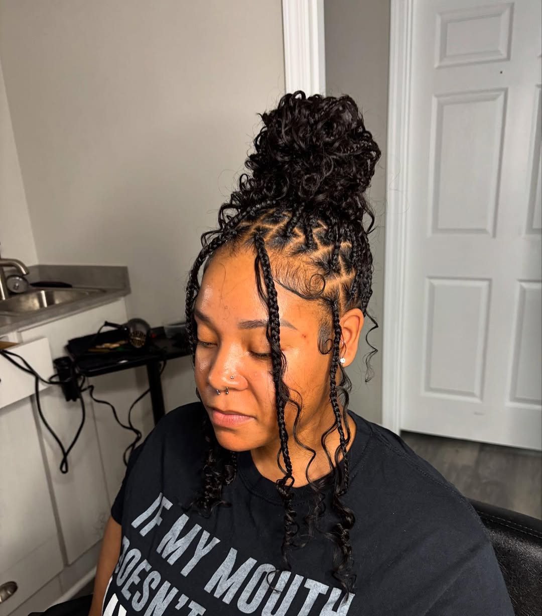 Trendy High Bun Knotless Box Braids with Face-Framing Curls