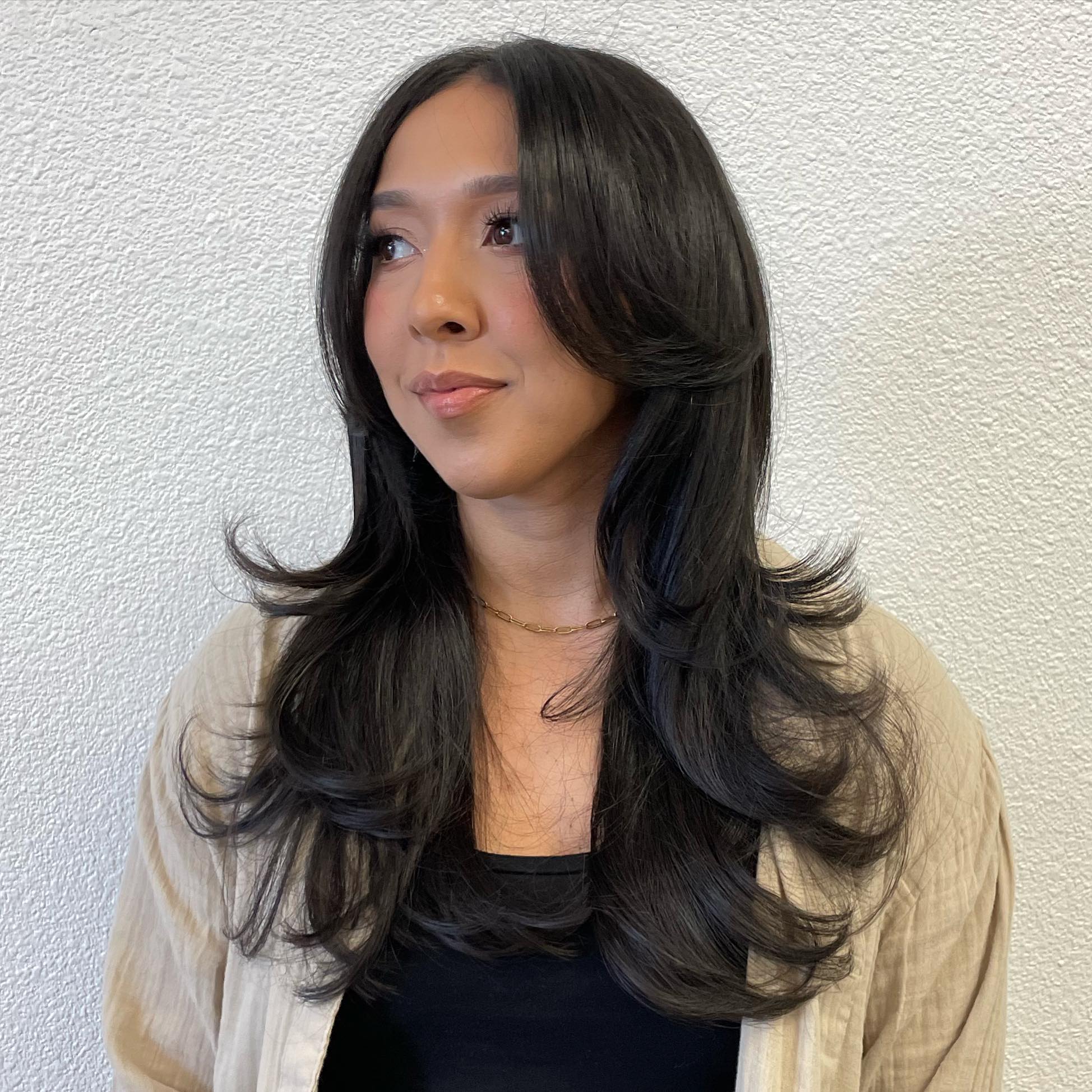Soft Layered Hush Cut with Gentle Face Framing