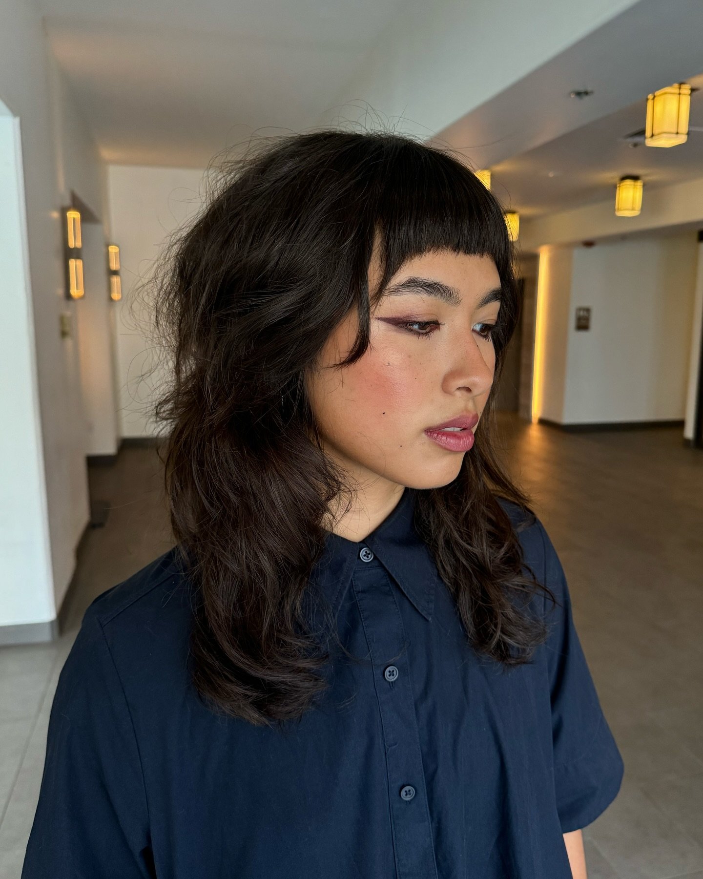 Textured Hush Cut with Soft Bangs and Natural Waves