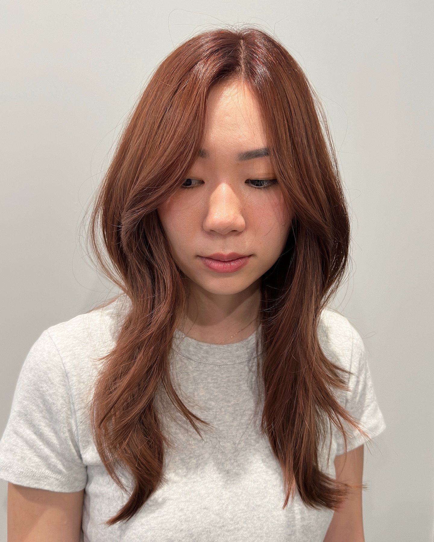 Warm Chestnut Hush Cut with Gentle Waves