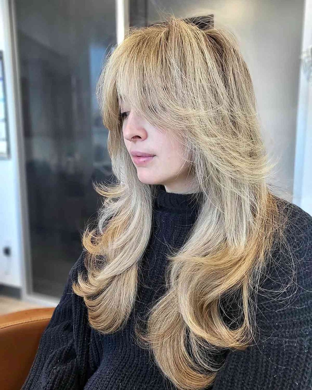 Charming Feathered Layers with Soft Golden Tones