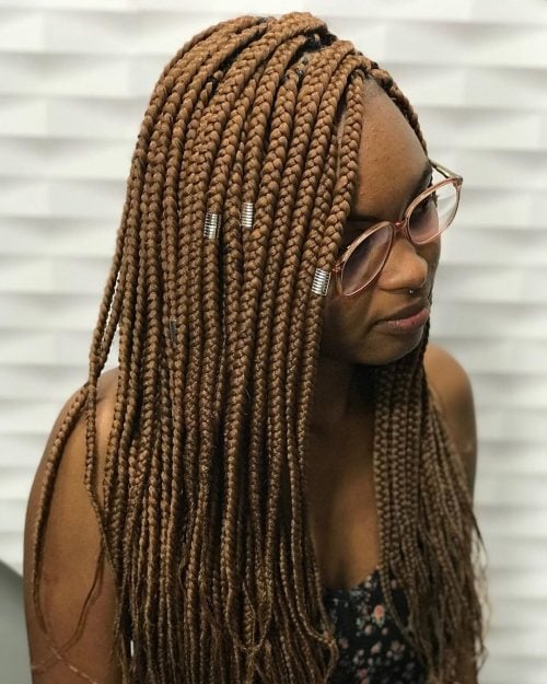 Vibrant Blonde Box Braids with Unique Accents