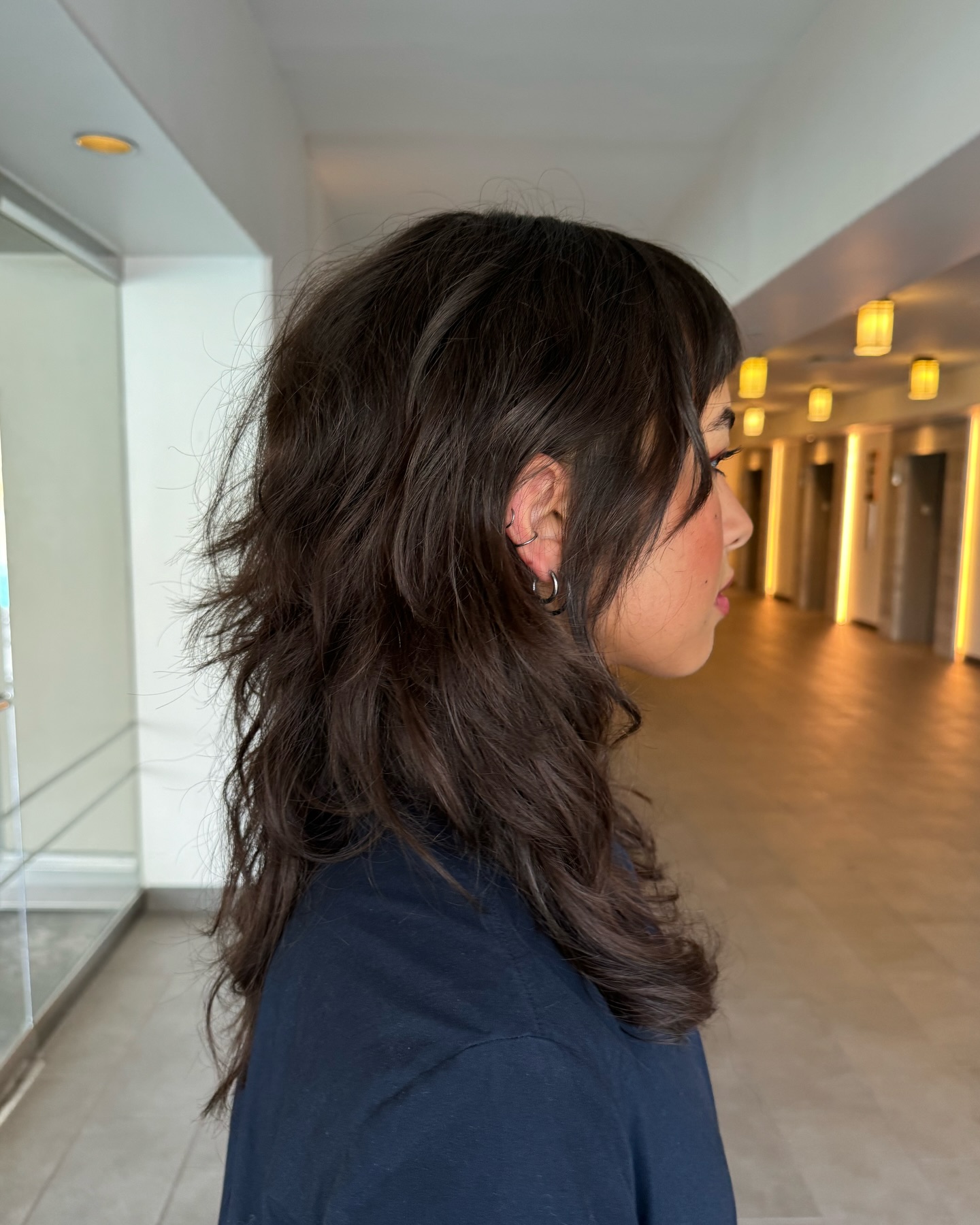 Choppy Layered Hush Cut with Soft Waves