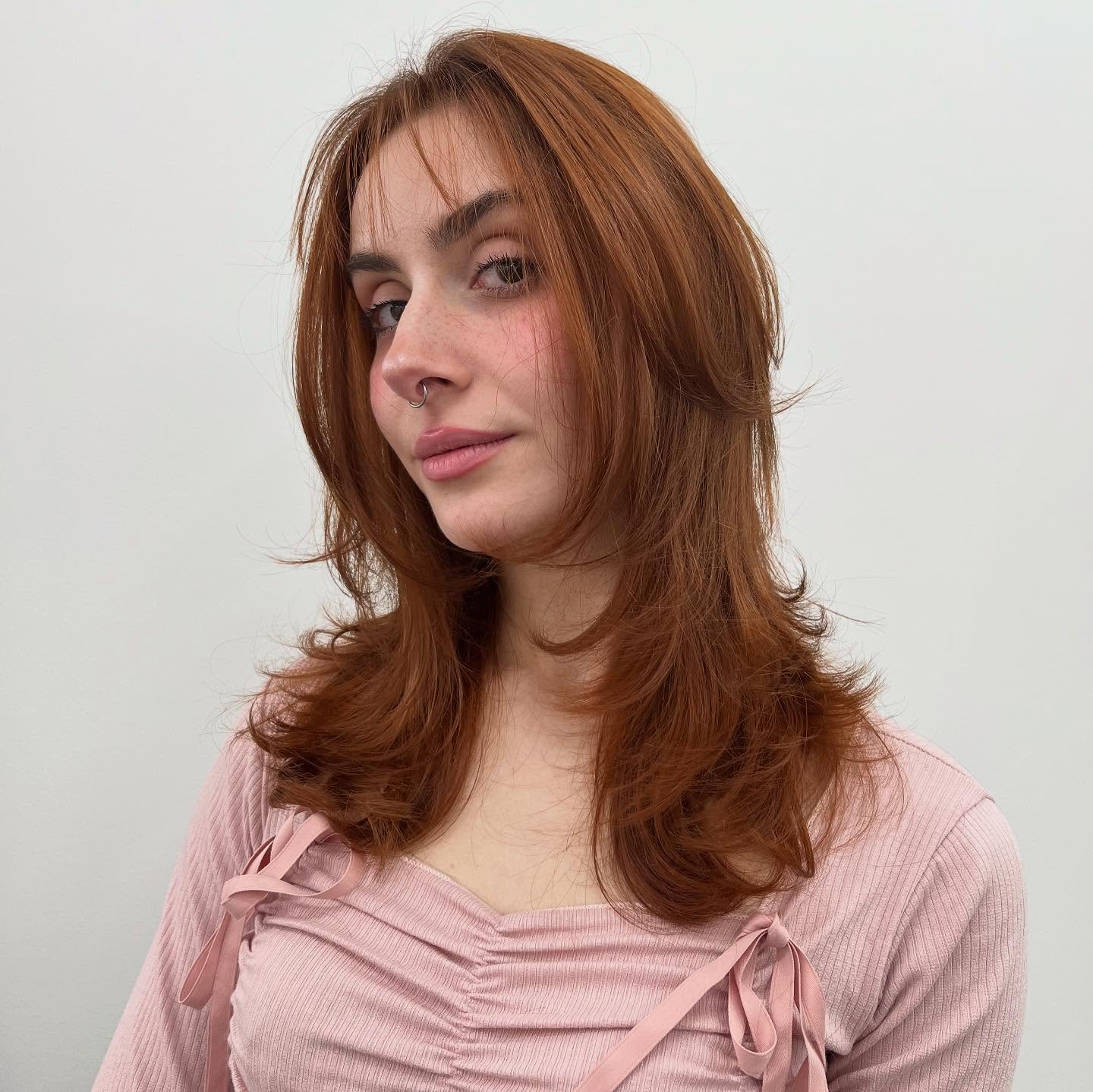 Radiant Copper Layered Hush Cut with Soft Face-Framing Strands