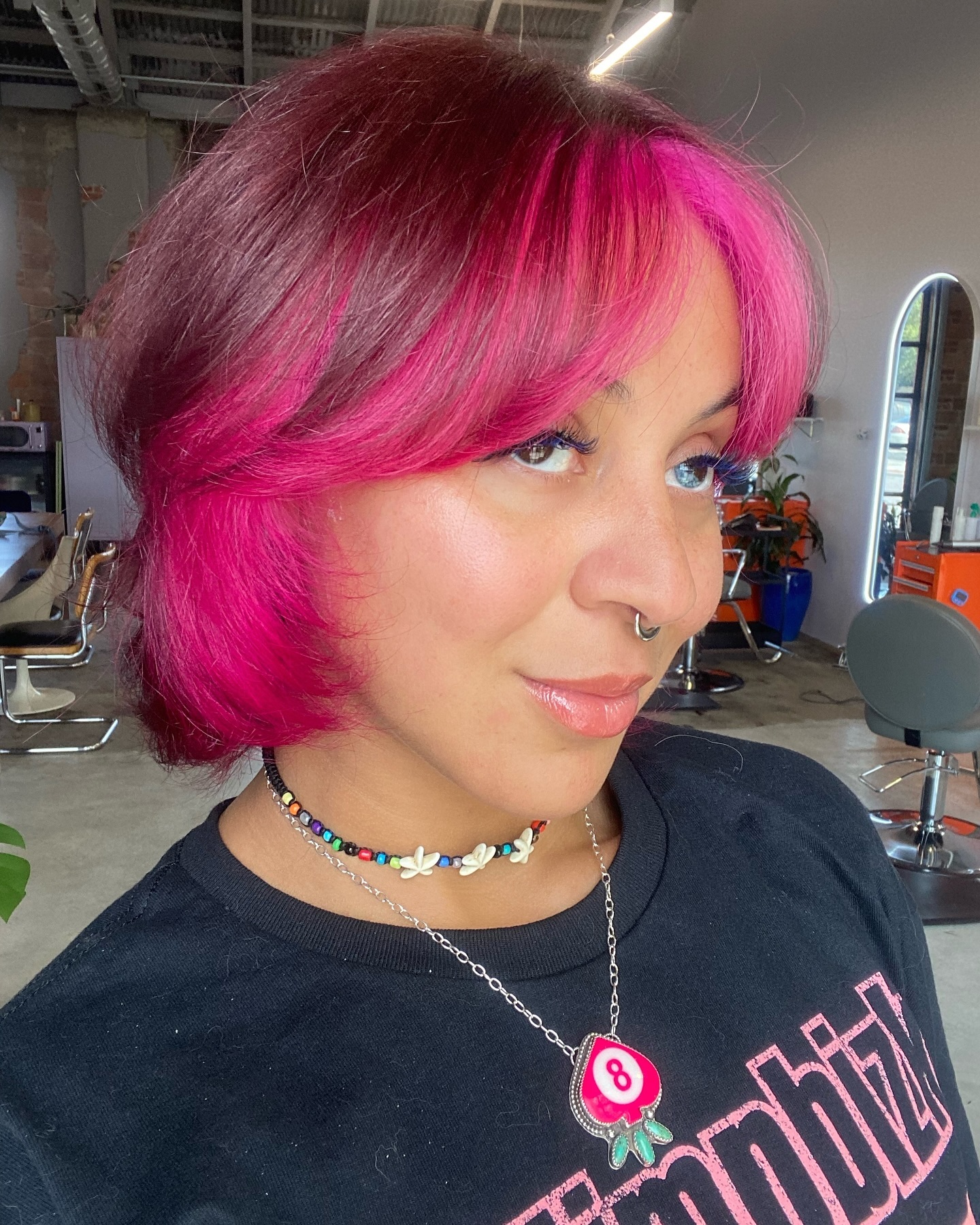 Bold Pink Bob with Face-Framing Bangs