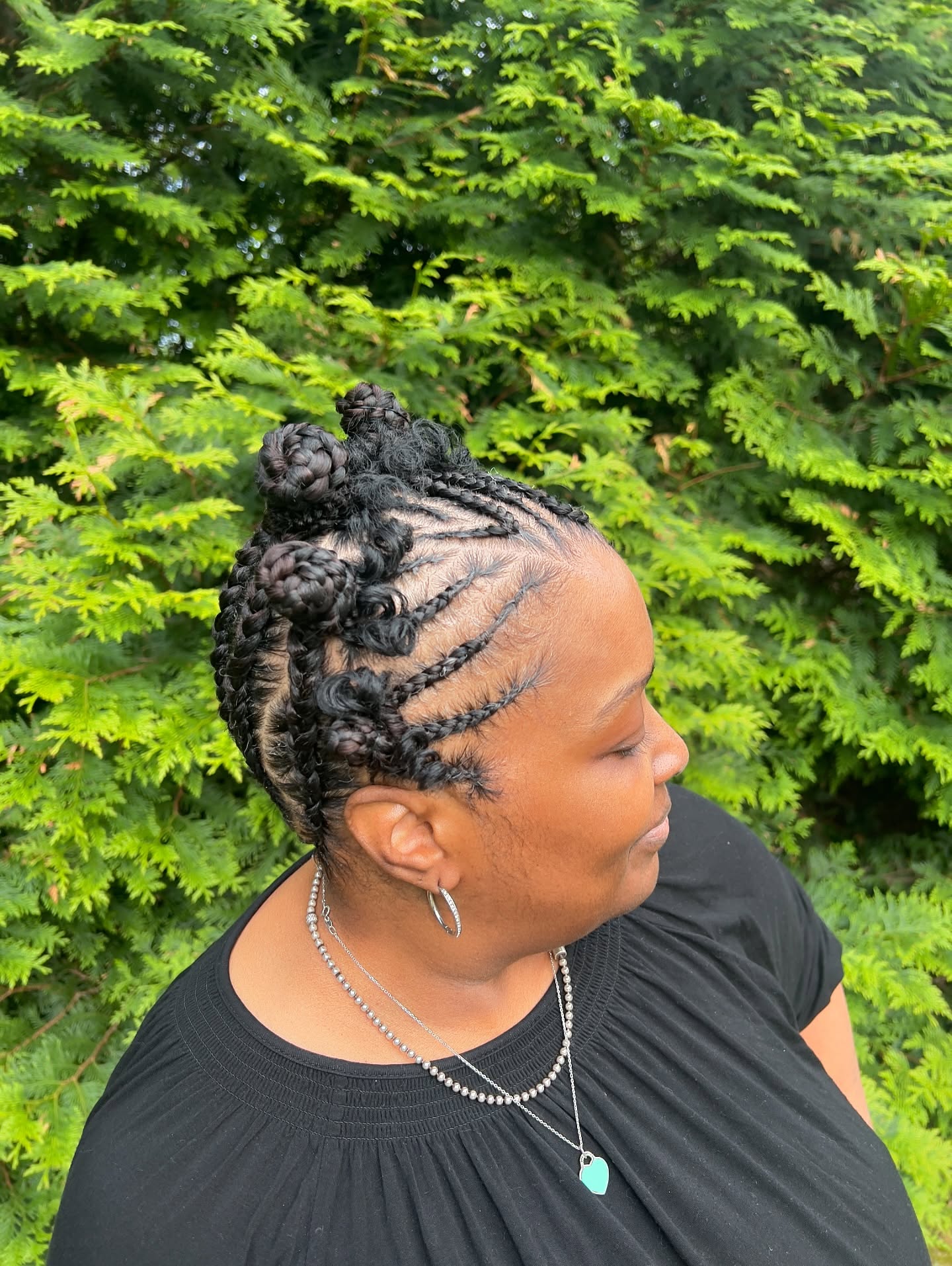 Stylish Braided Bantu Knots with Intricate Cornrows