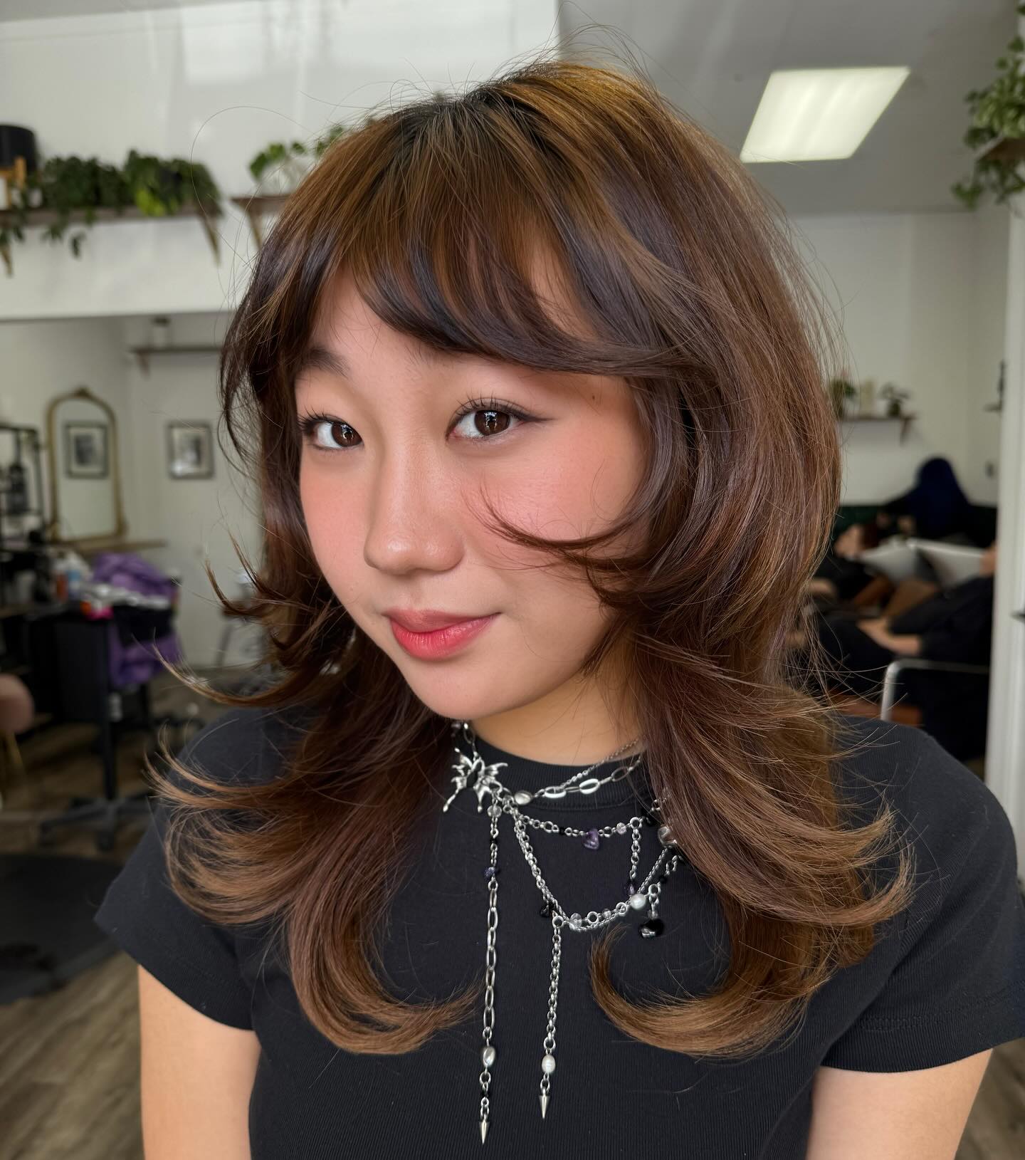 Textured Layered Cut with Soft Face-Framing Bangs