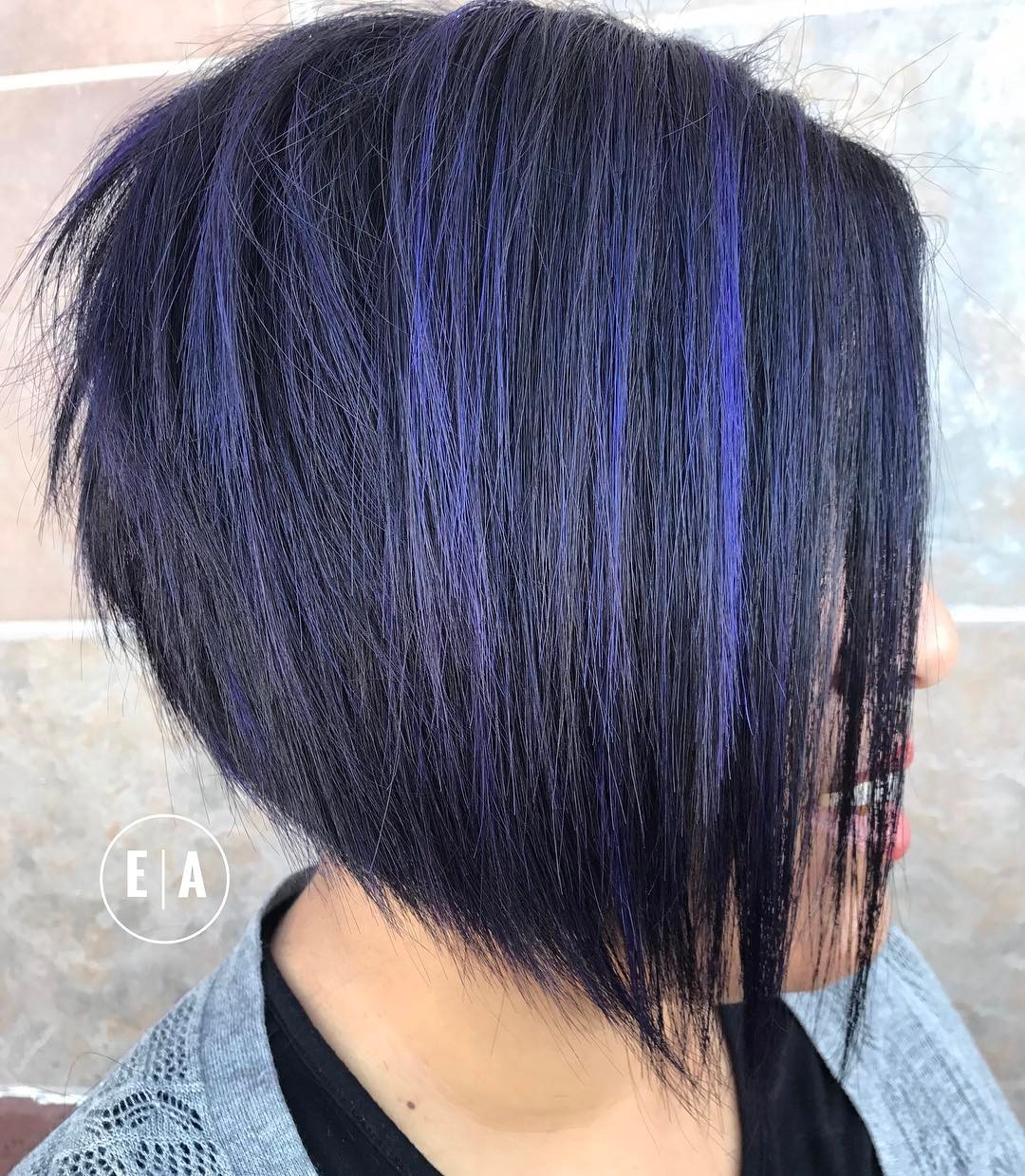 Bold Textured Angular Bob with Vibrant Purple Highlights