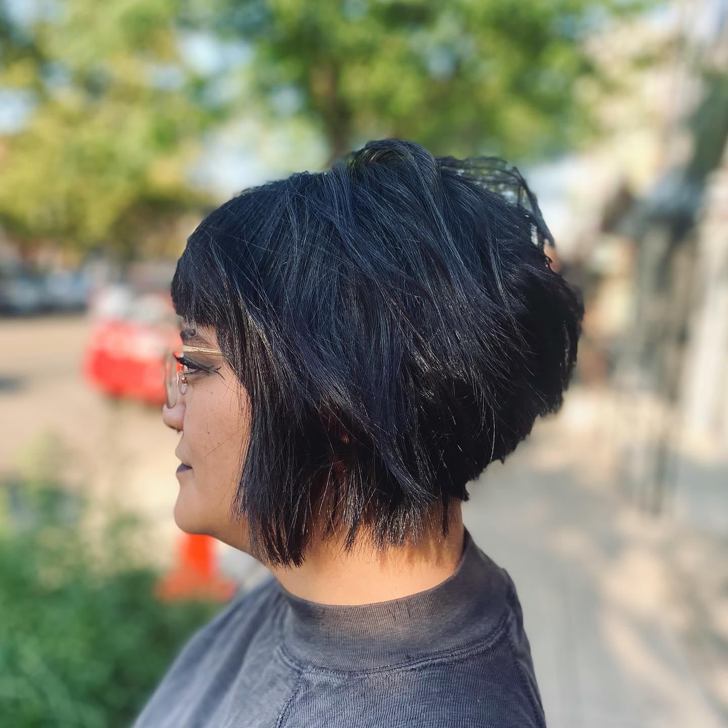 Chic Textured Angular Bob with Bold Fringe