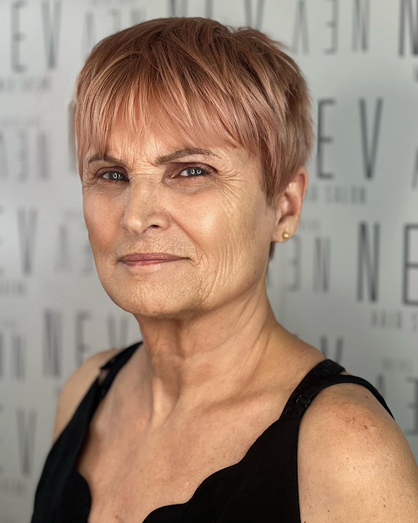 Chic Textured Pixie Cut with Subtle Rose Undertones
