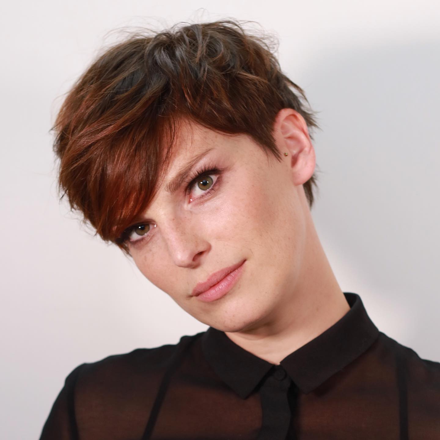Chic Textured Pixie with Bold Copper Highlights