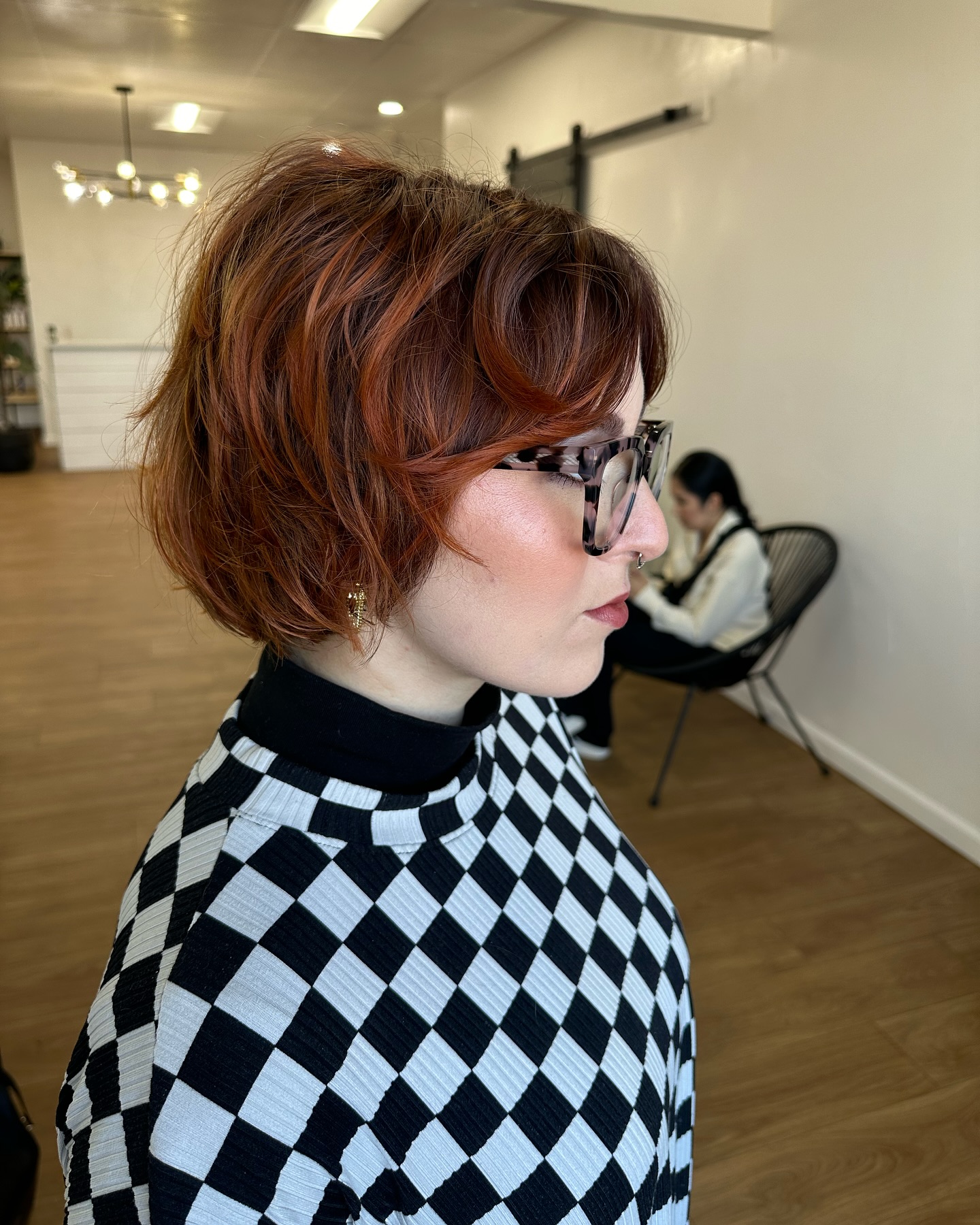 Chic Textured Wispy Bob with Rich Copper Tones