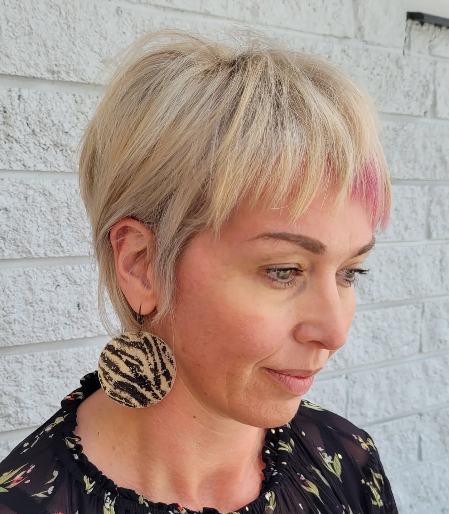 Edgy Textured Pixie with Subtle Pink Highlights