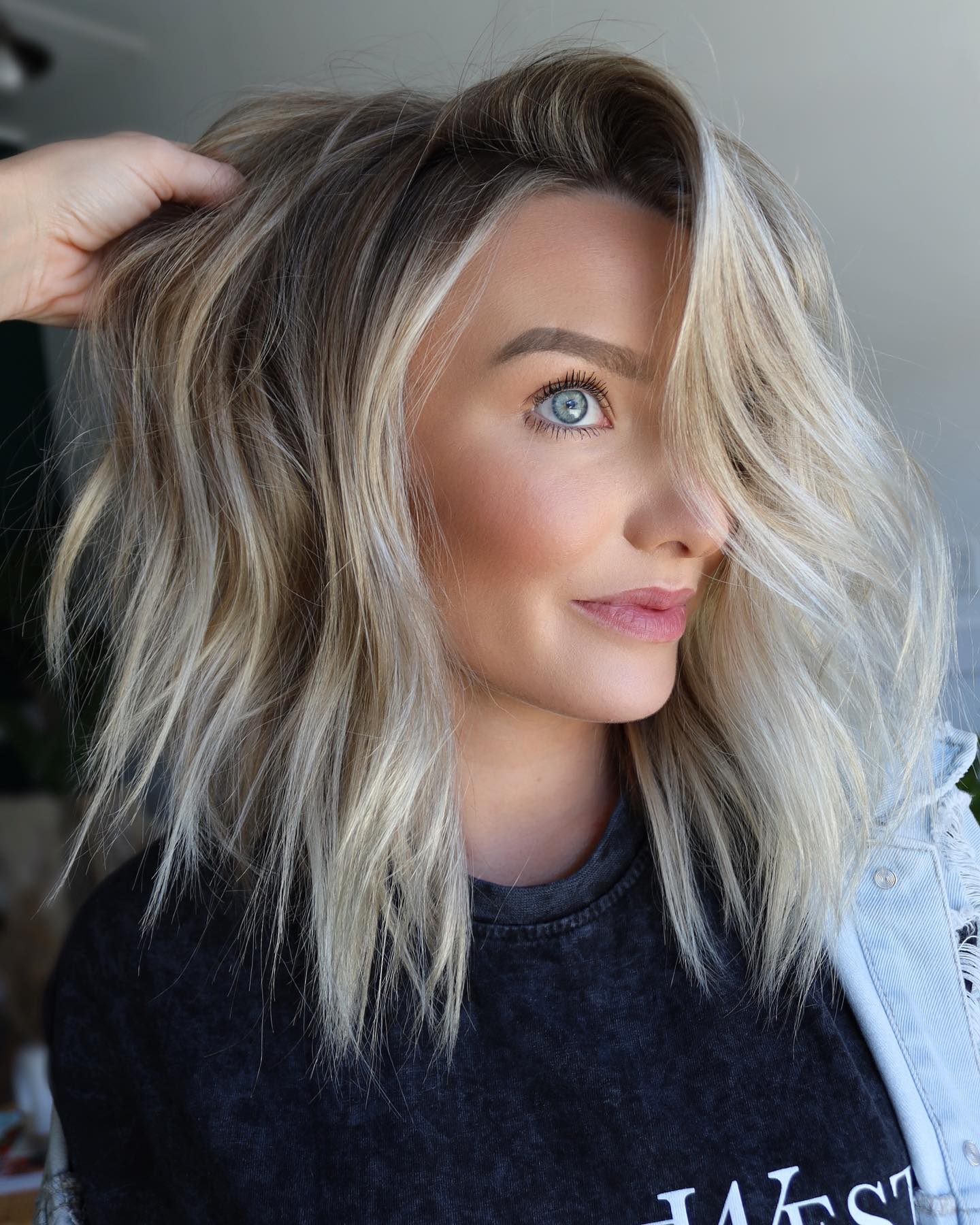 Effortlessly Textured Angular Bob with Sun-Kissed Highlights