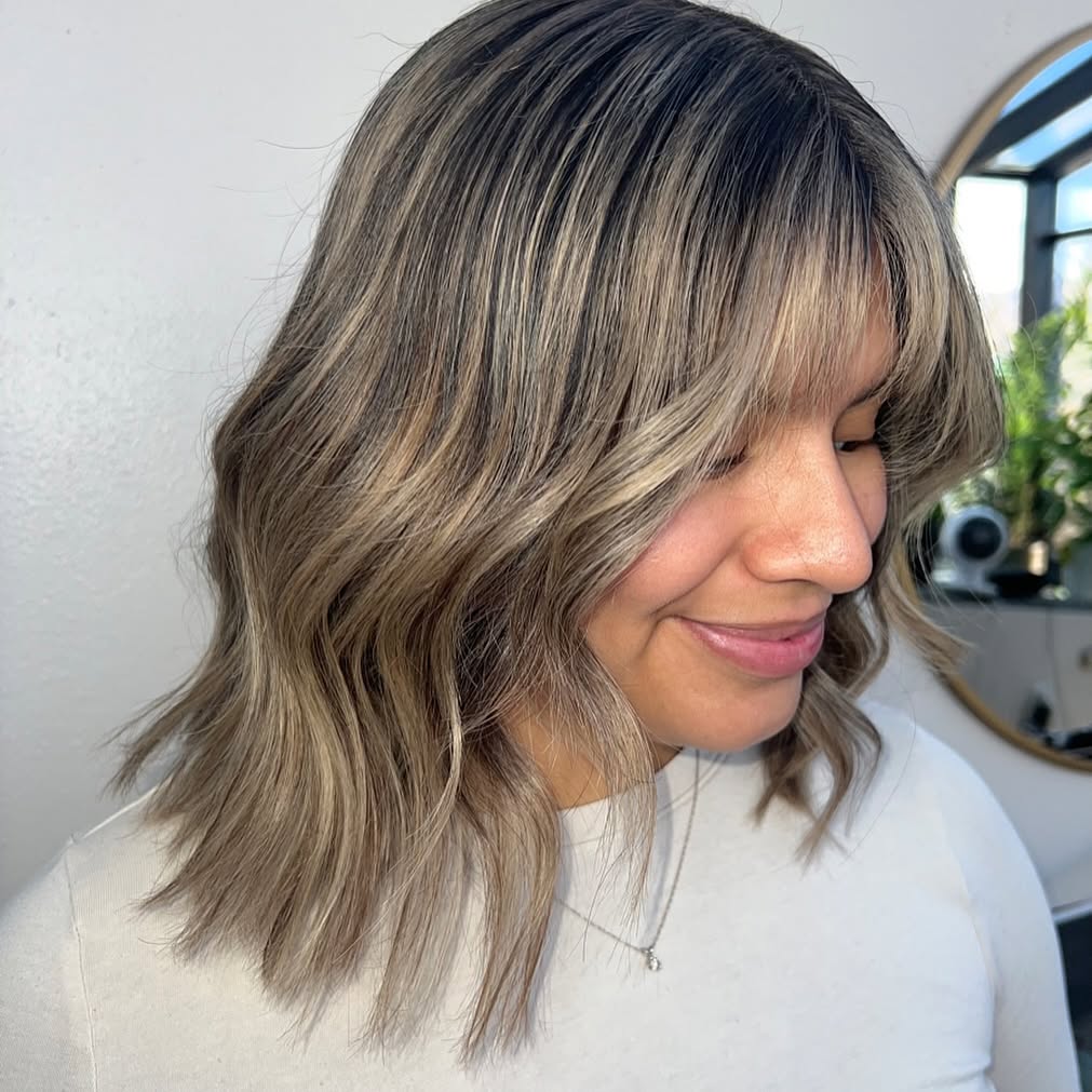 Layered Wispy Bob with Subtle Highlights