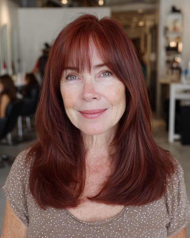 Long Layered Red Hair with Soft Bangs