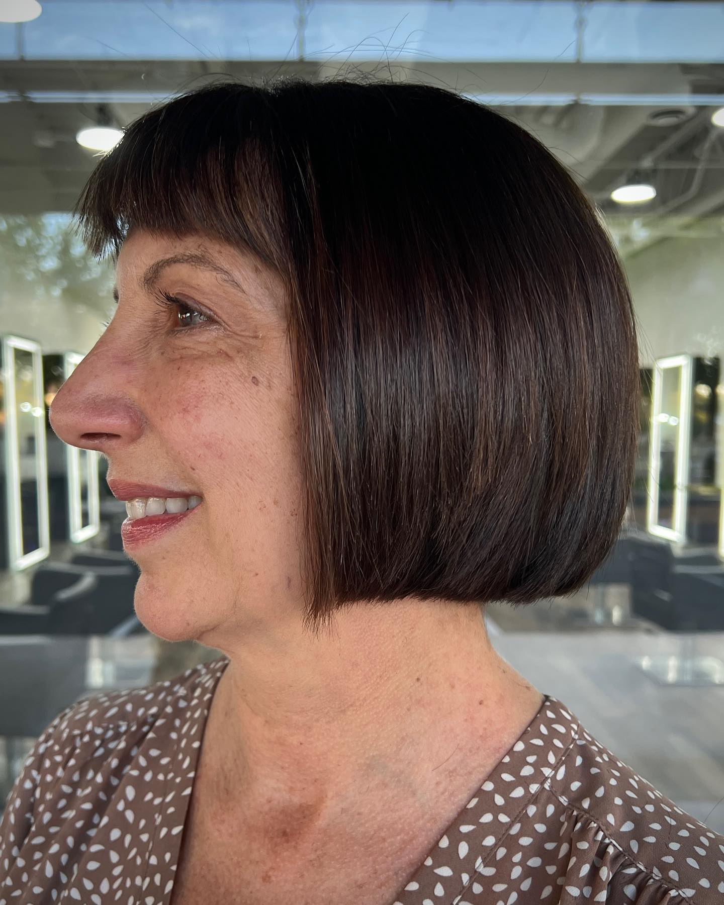 Sleek Dark Brown Bob with Subtle Bangs