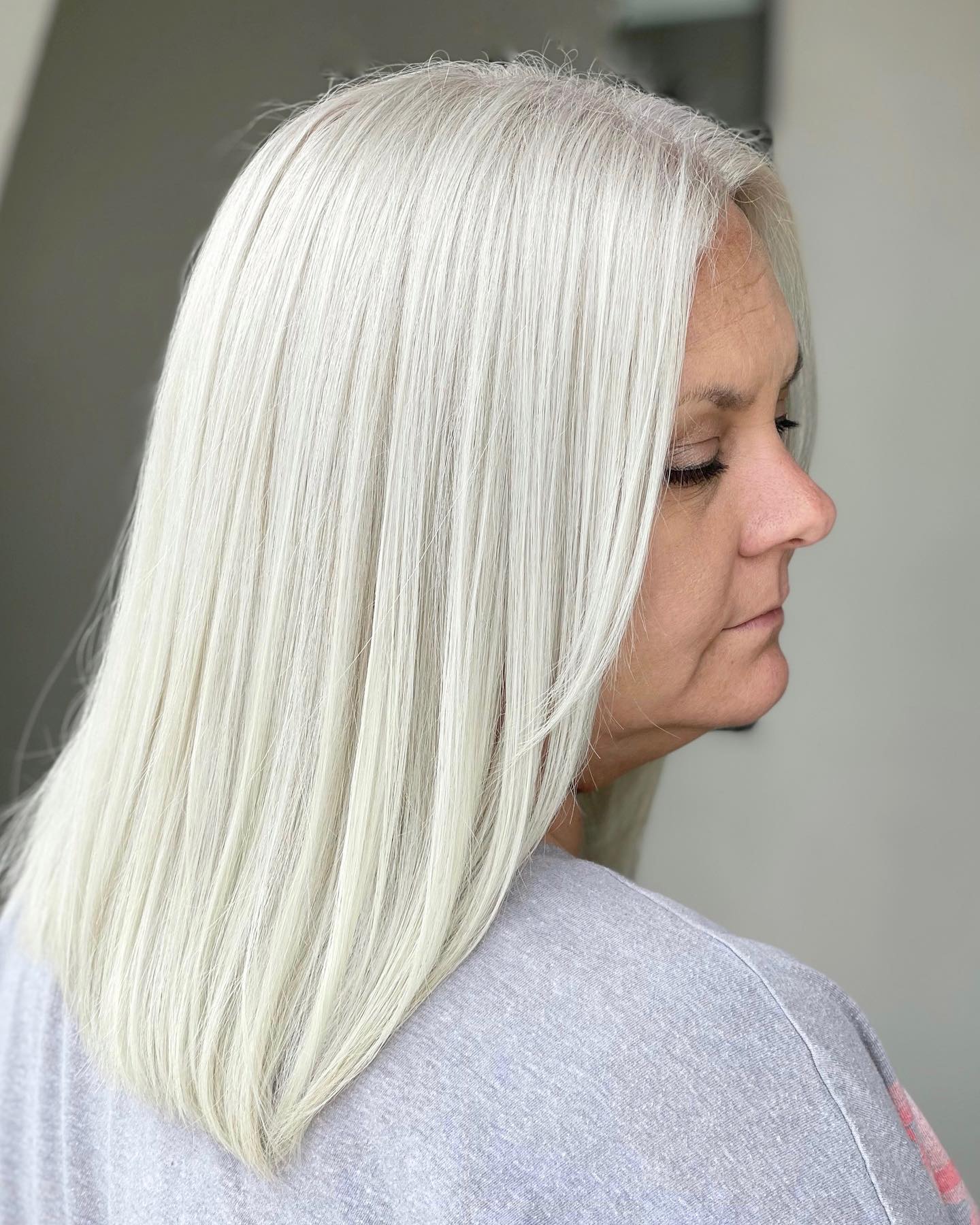 Sleek Long Silvery Blonde Hair with Subtle Texture