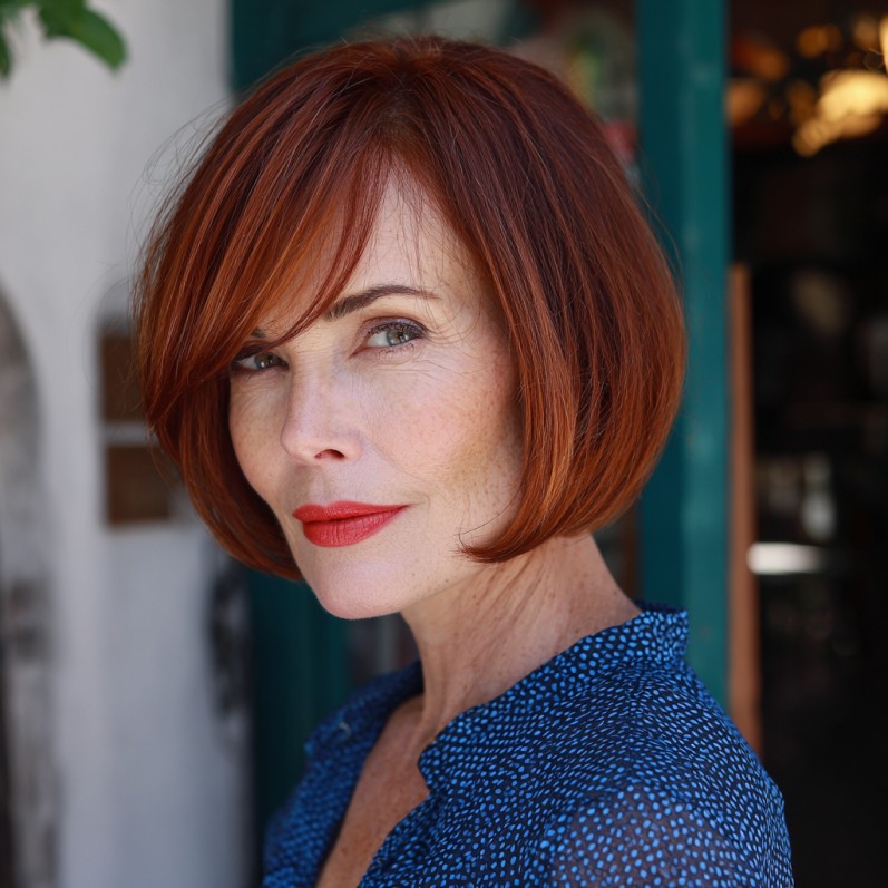 Sleek Modern Red Bob with Side-Swept Bangs