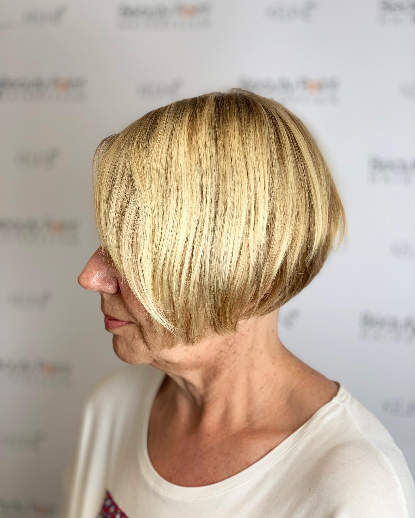 Soft Blonde Angled Bob with Subtle Layers
