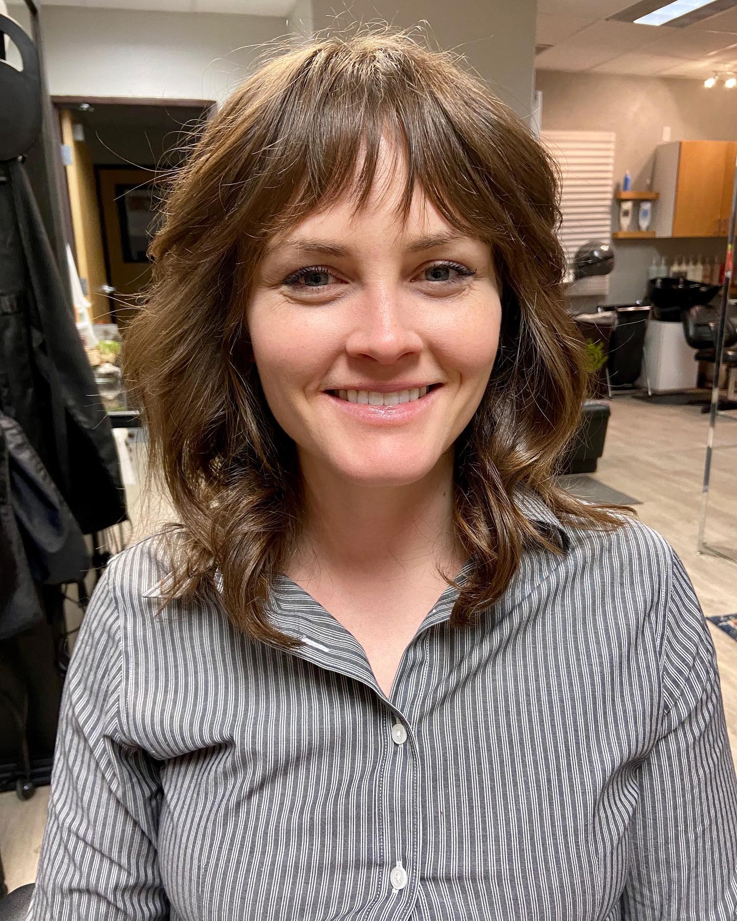 Softly Layered Choppy Bangs with Natural Waves