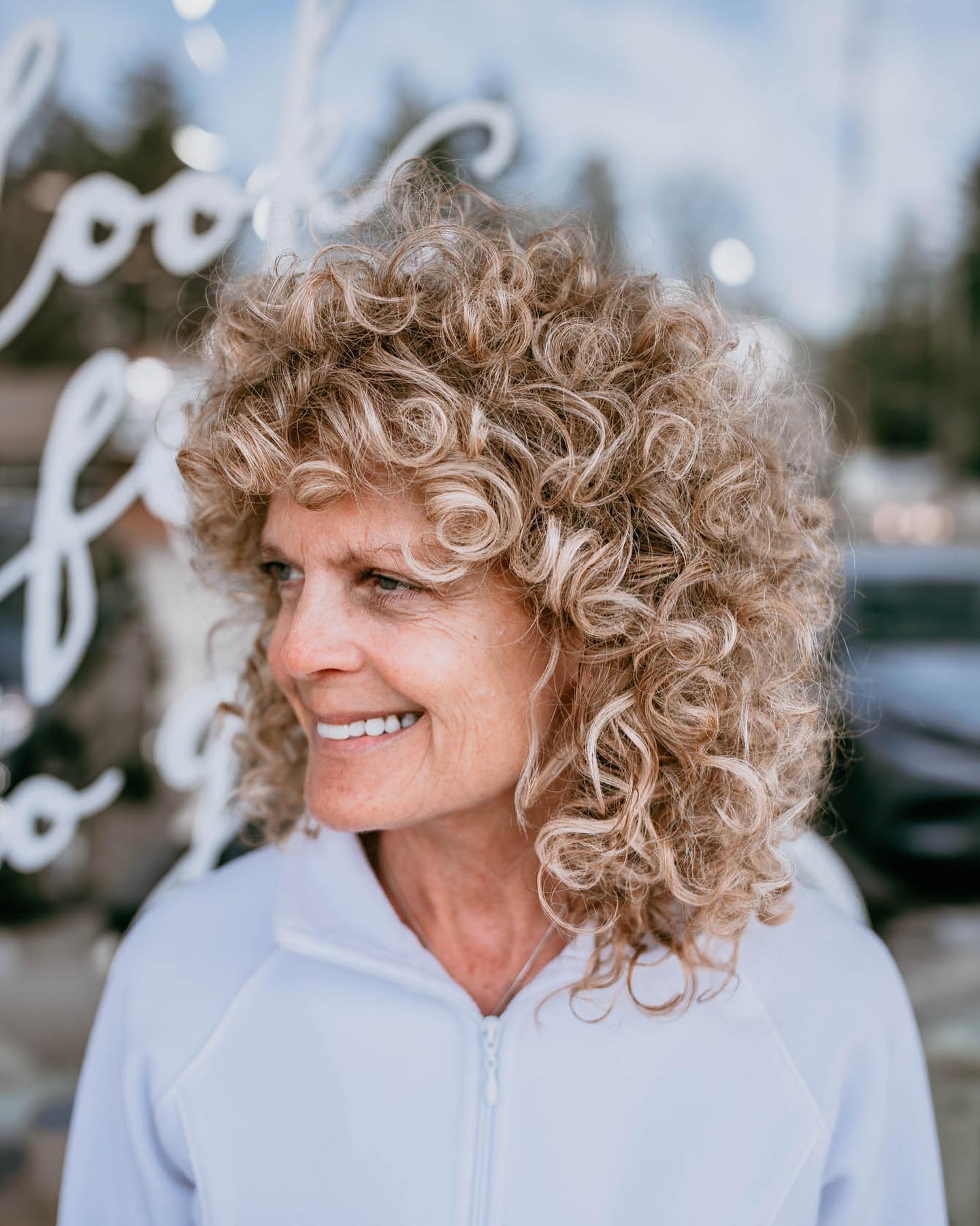 Textured Blonde Curly Bob with Lively Volume