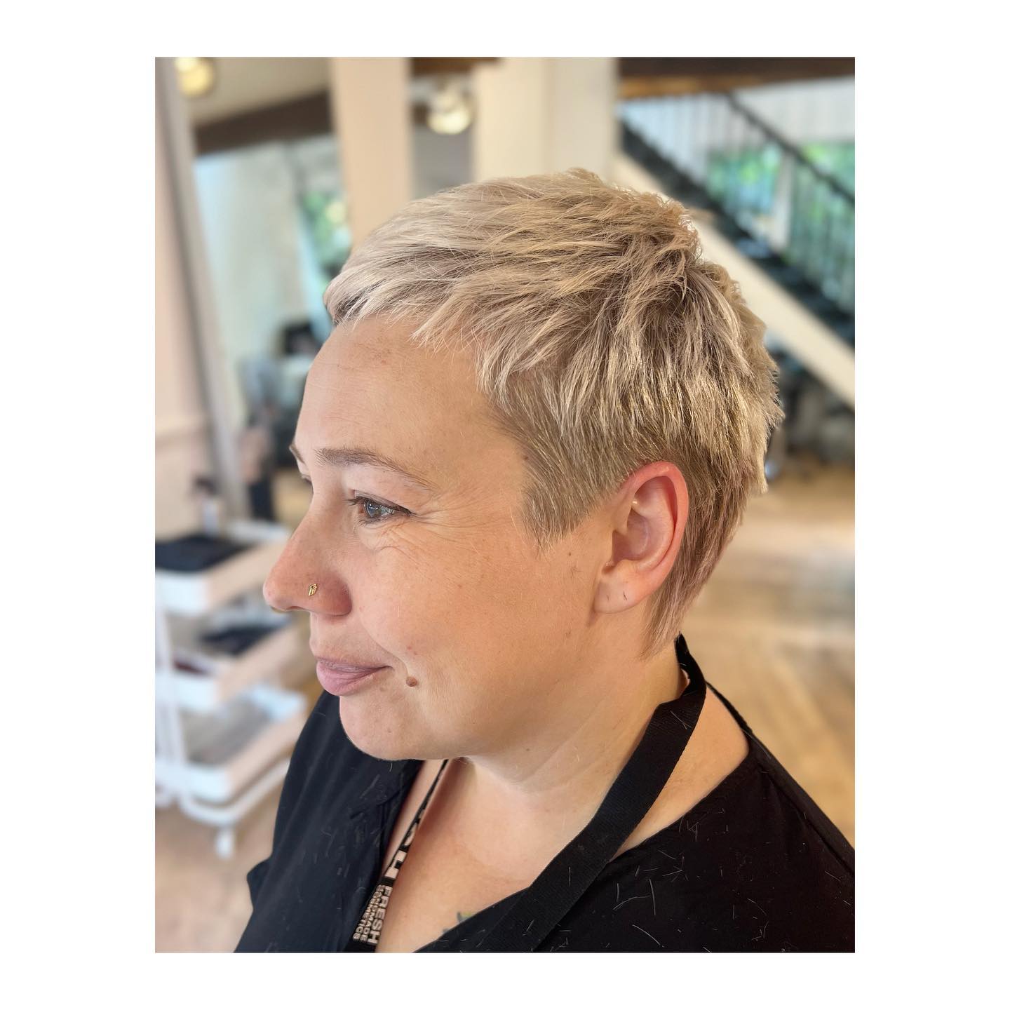 Textured Platinum Pixie Cut with Subtle Layers
