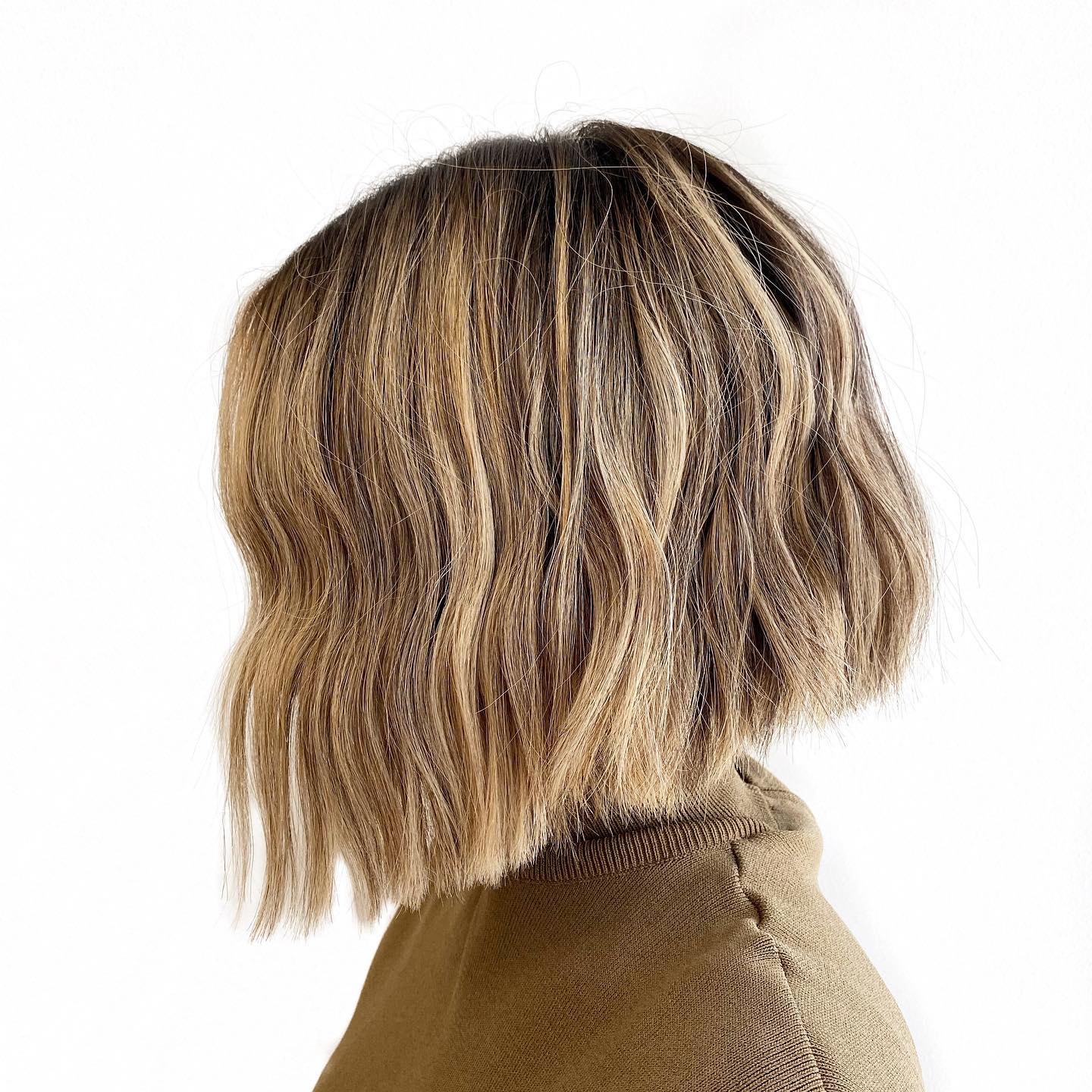 Textured Wavy Angular Bob with Natural Highlights