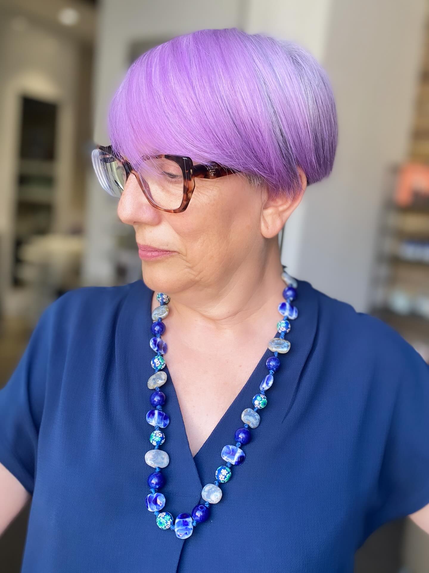 Vibrant Lavender Short Bob with Subtle Highlights