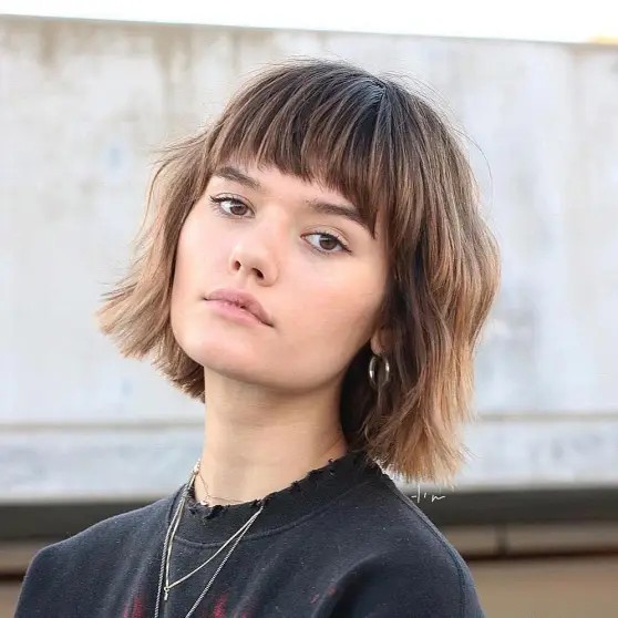 Choppy Textured Bob with Bold Bangs for Square Faces