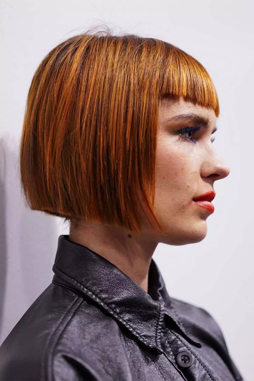 Bold Copper Pageboy Bob with Textured Fringe