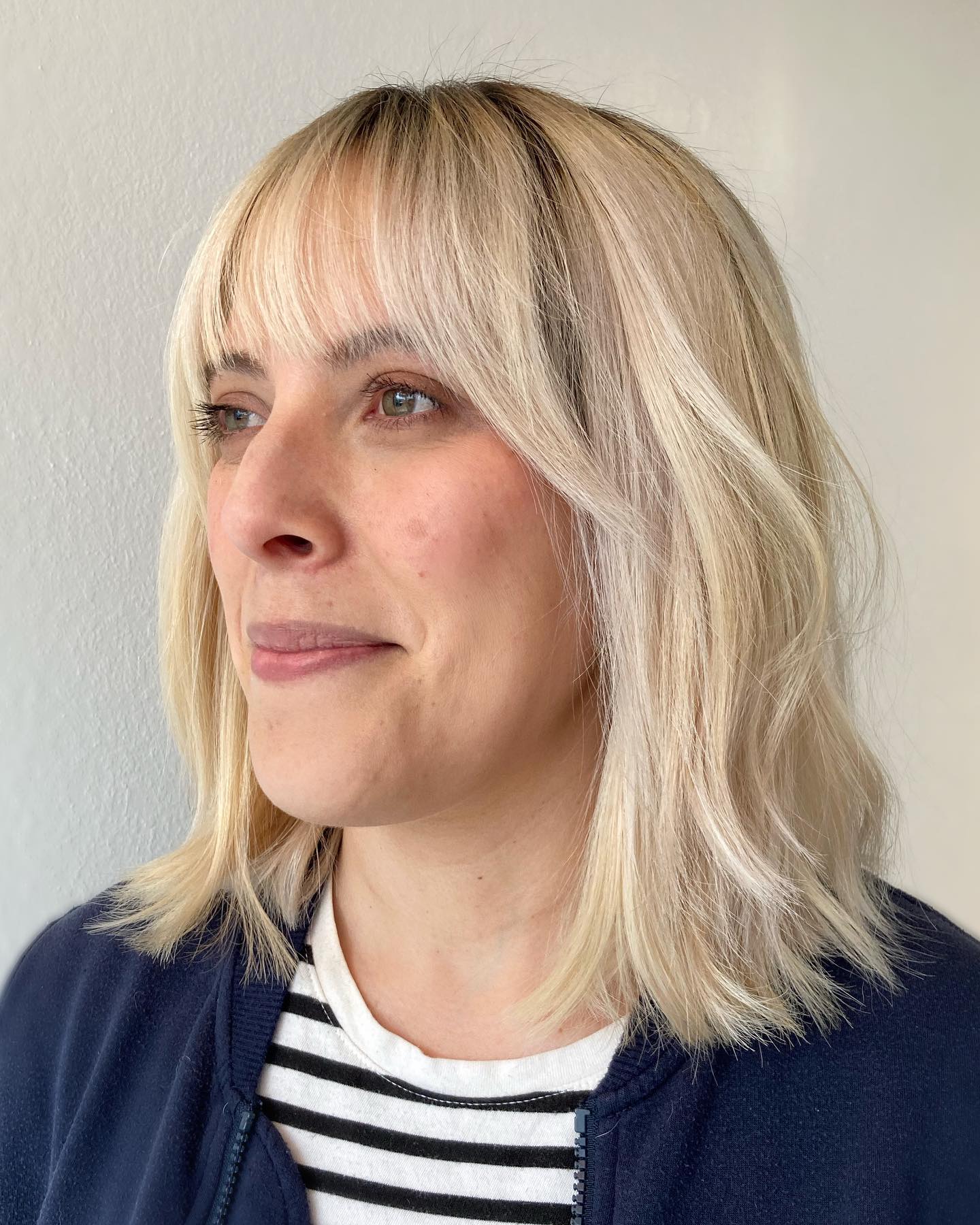 Chic Light Blonde Cut with Soft Bangs