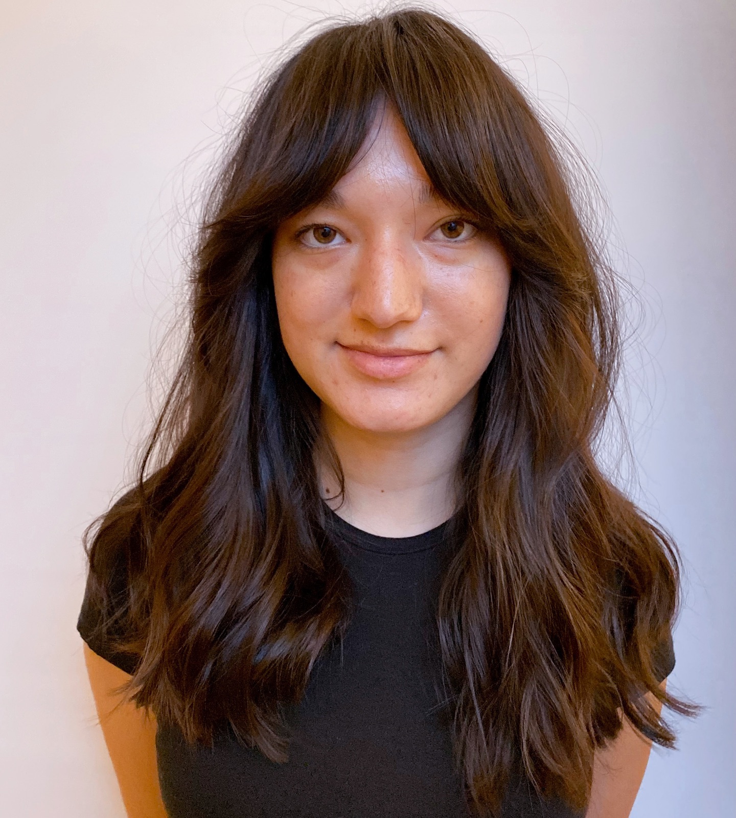 Chic Textured Cut with Soft Blunt Bangs