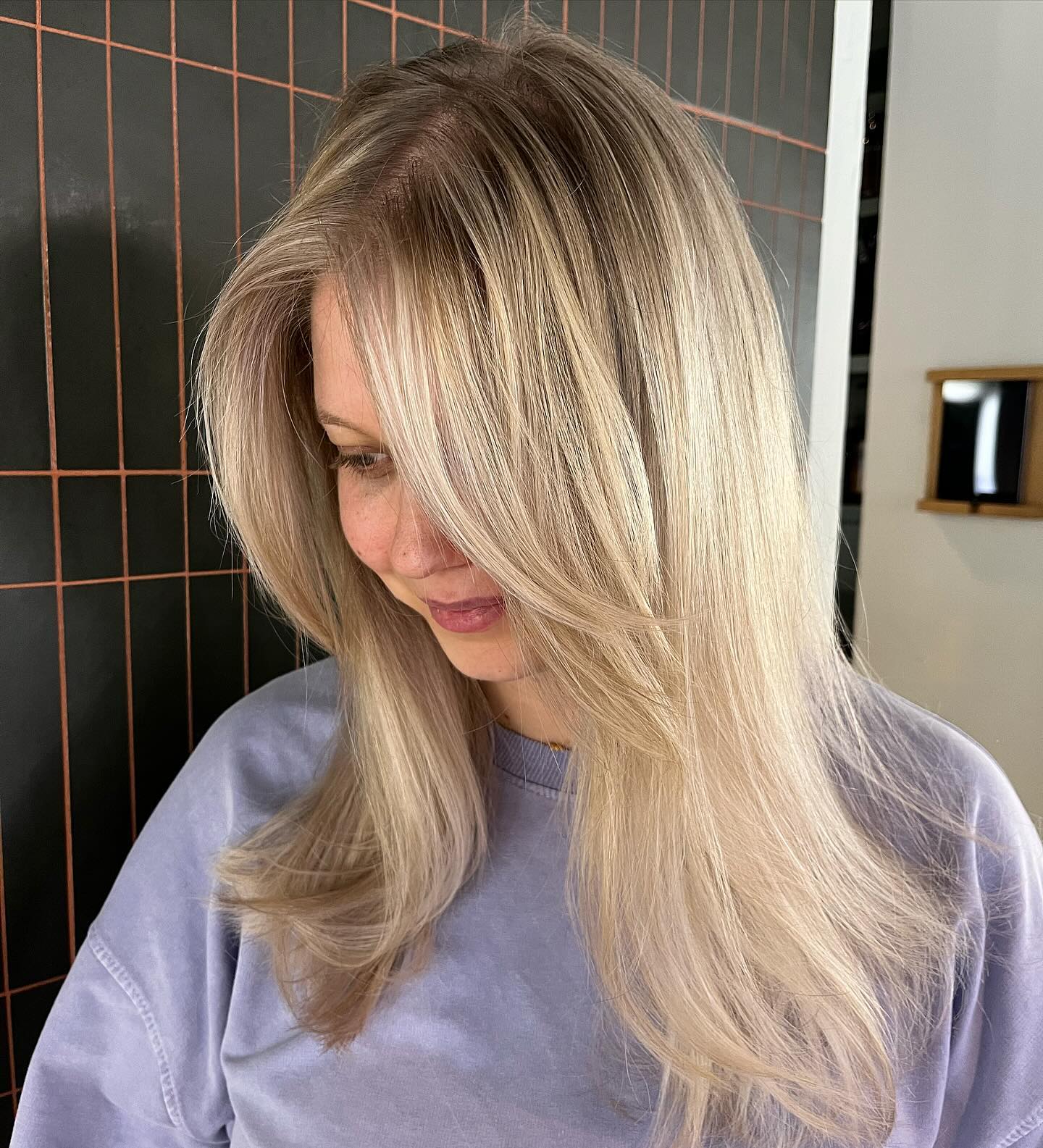Elegant Light Blonde Long Layers with Soft Movement