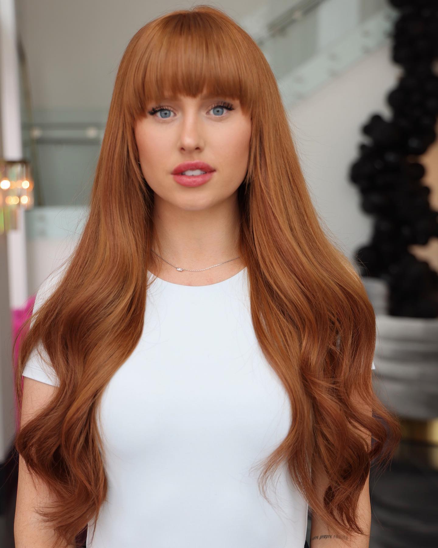Long, Layered Cut with Bold Blunt Bangs