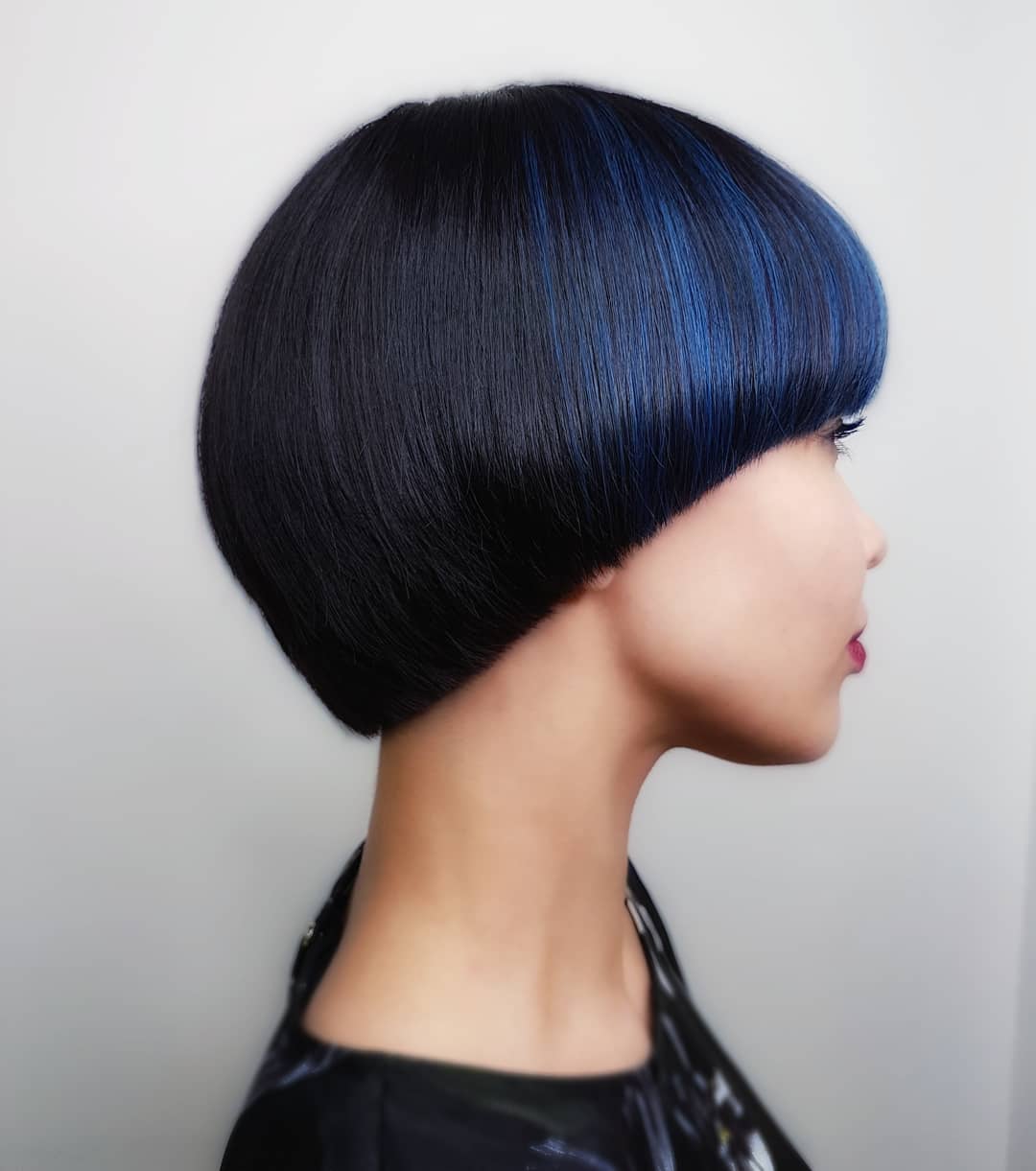 Modern Stacked Pageboy Bob with Bold Blue Highlights