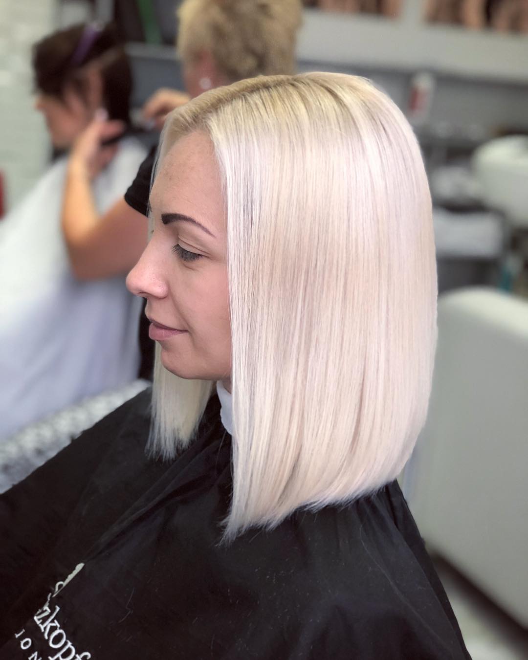 Sleek Light Blonde Blunt Bob with Subtle Shine
