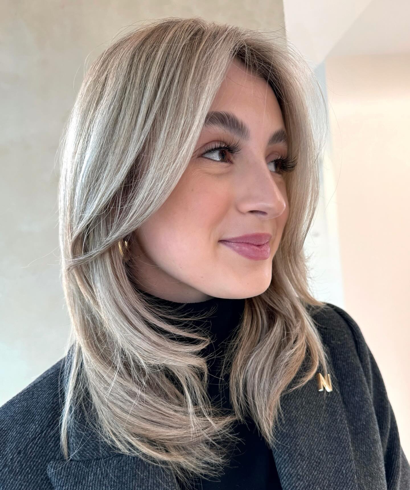 Soft Layered Light Blonde Cut with Natural Movement