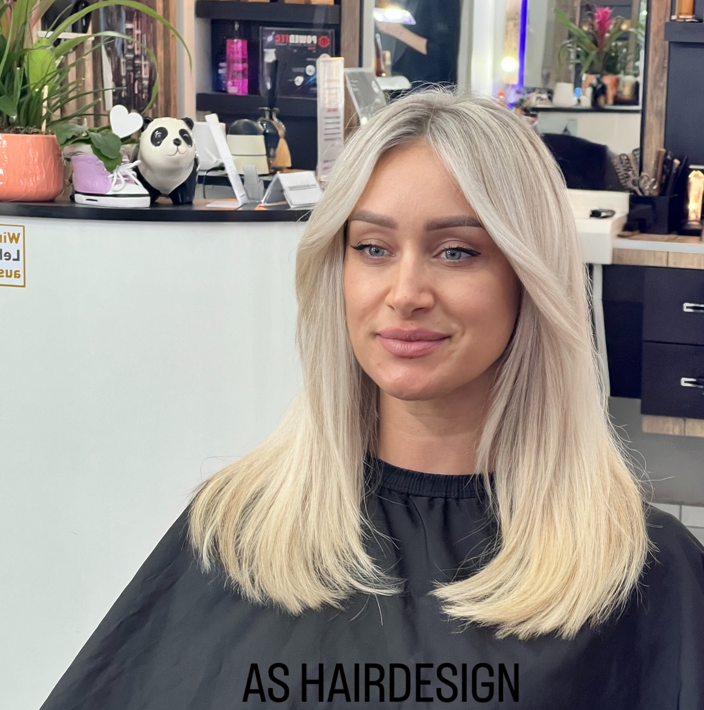 Soft Light Blonde Cut with Subtle Face-Framing Layers