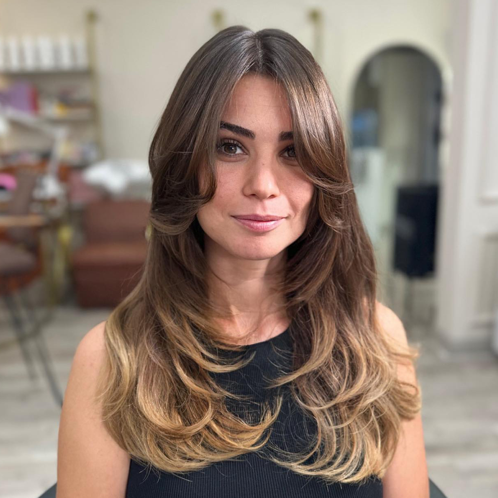 Softly Layered Long Cut with Wispy Bangs