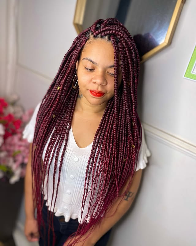 Vibrant Burgundy Box Braids with Stylish Accents
