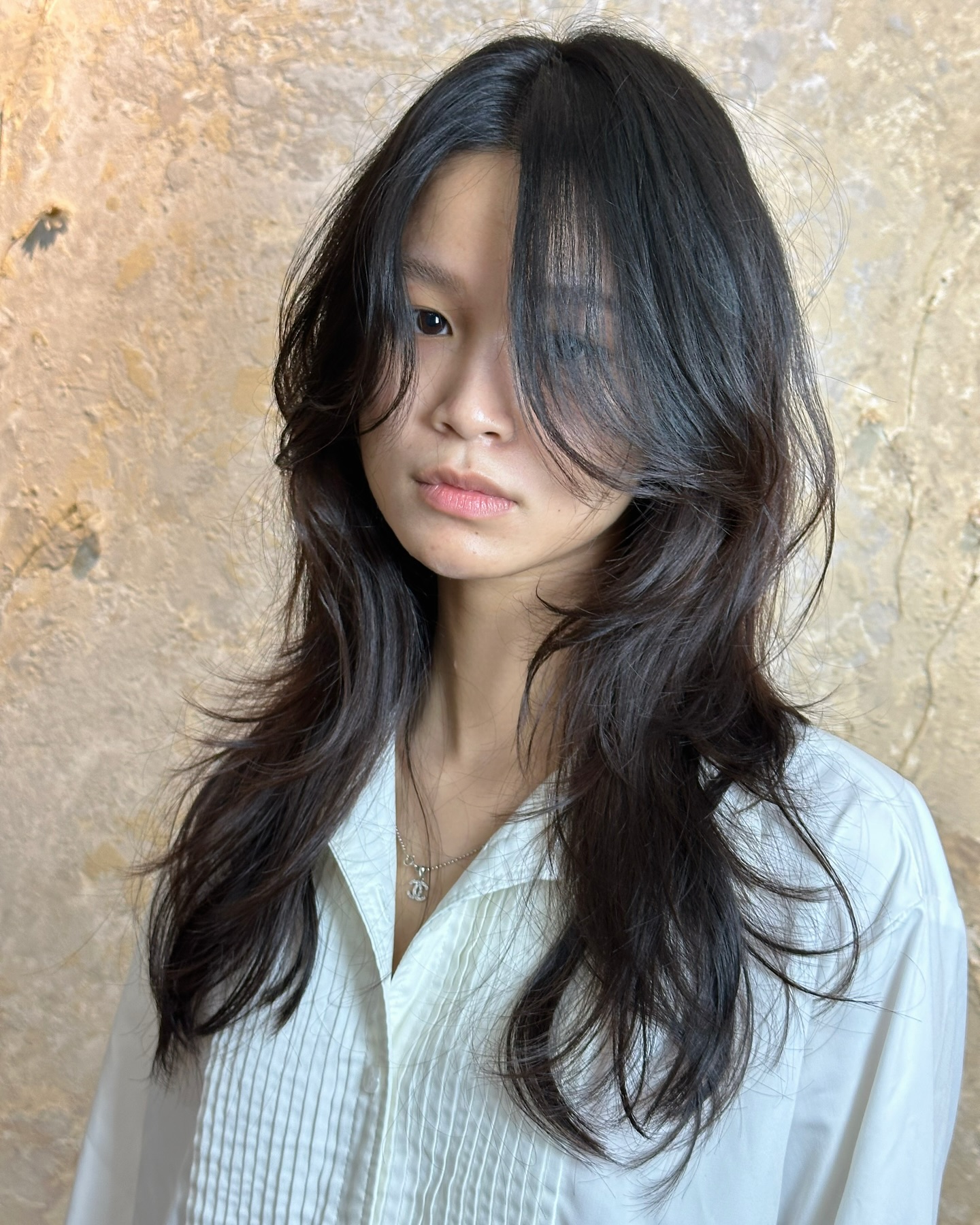 Chic Textured Long Hush Cut with Soft Face Framing