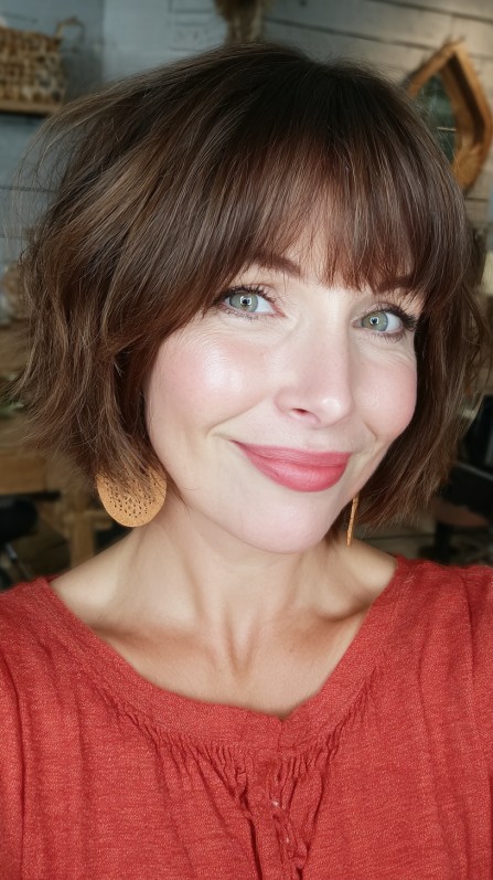 Textured Bob with Soft Bangs and Warm Undertones