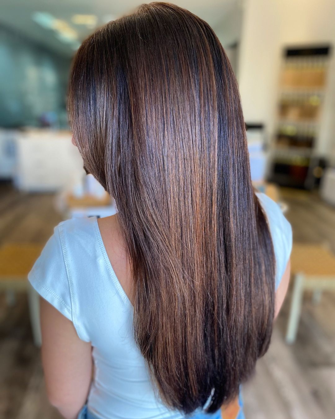 Glossy Long Layers with Rich Chestnut Highlights