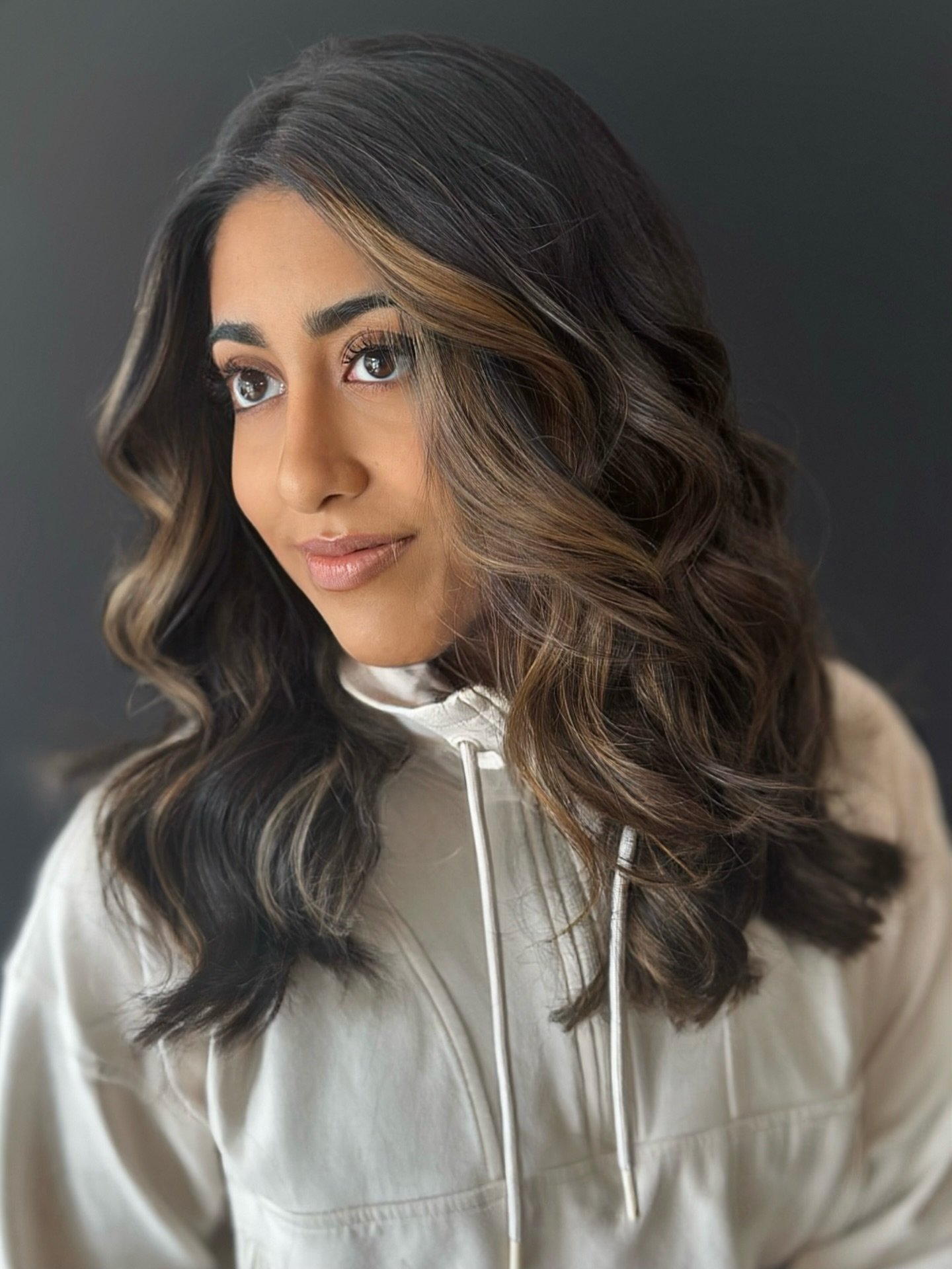 Gorgeous Long Layered Waves with Warm Highlights