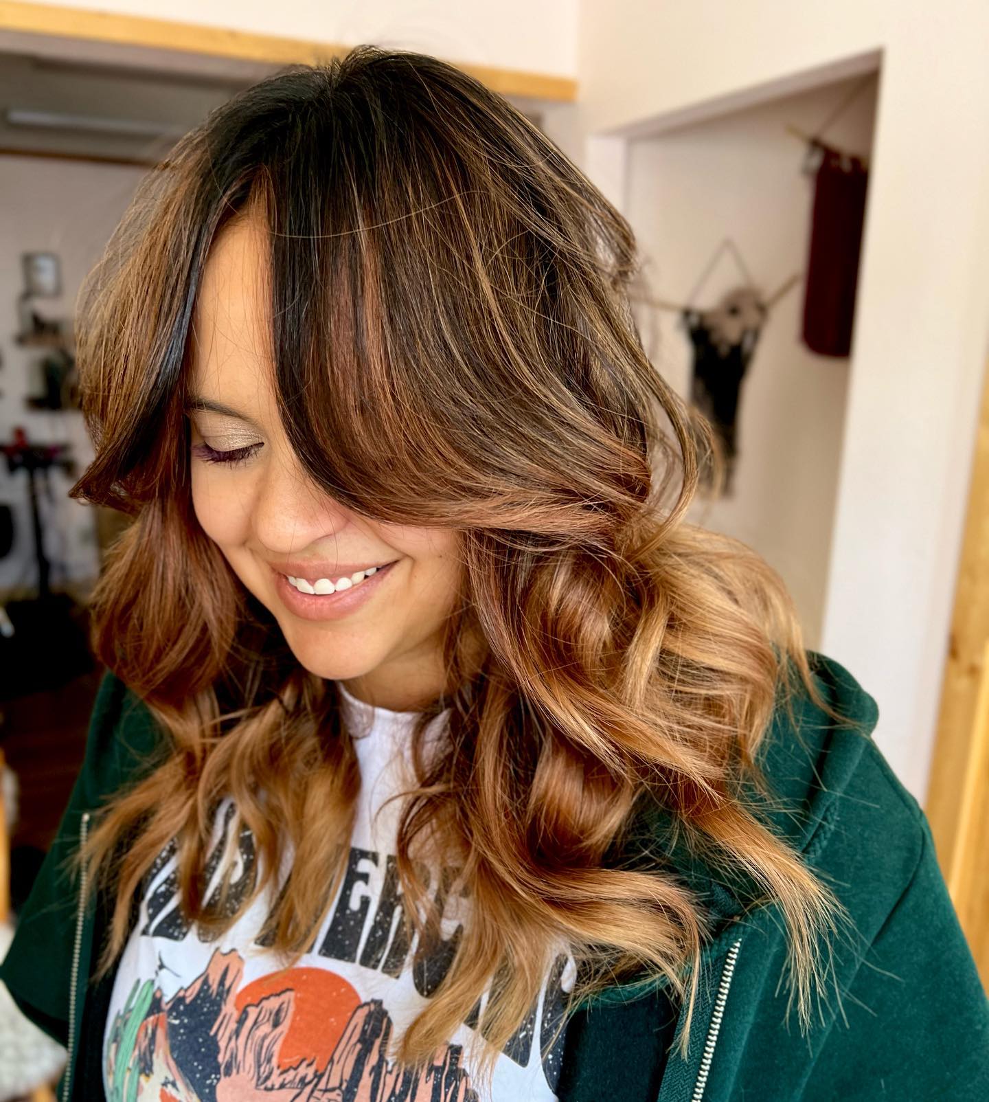 Warm Caramel Waves with Face-Framing Layers