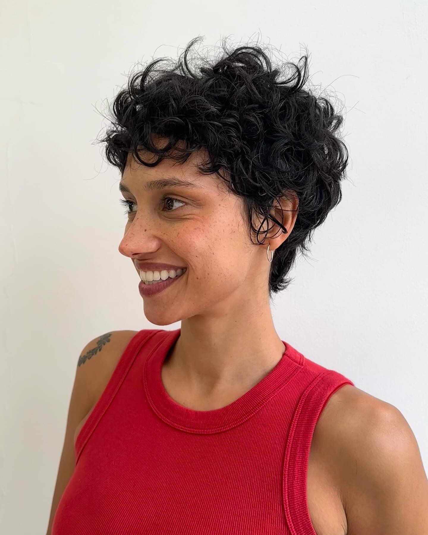 Textured Curly Pixie Cut with Defined Curls